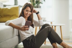 Woman Typing A Text Message